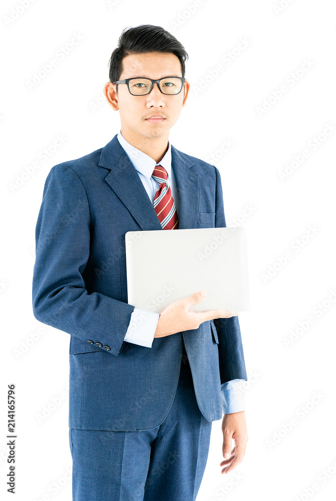 Businessman portrait in suit holding a laptop over white background Businessman portrait in suit holding a laptop over white background