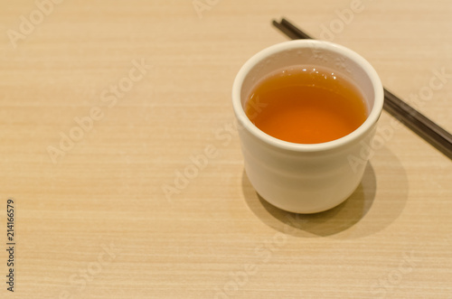 a cup of hot tea on soft light