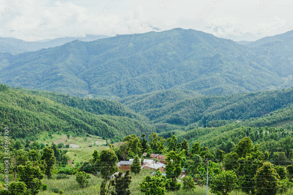 Arieal View of Beautiful Nepali Village sorrounded by the Green Forest,Mountain Village,Gorkha Nepal Arieal View of Beautiful Nepali Village sorrounded by the Green Forest,Mountain Village,Gorkha Nepal