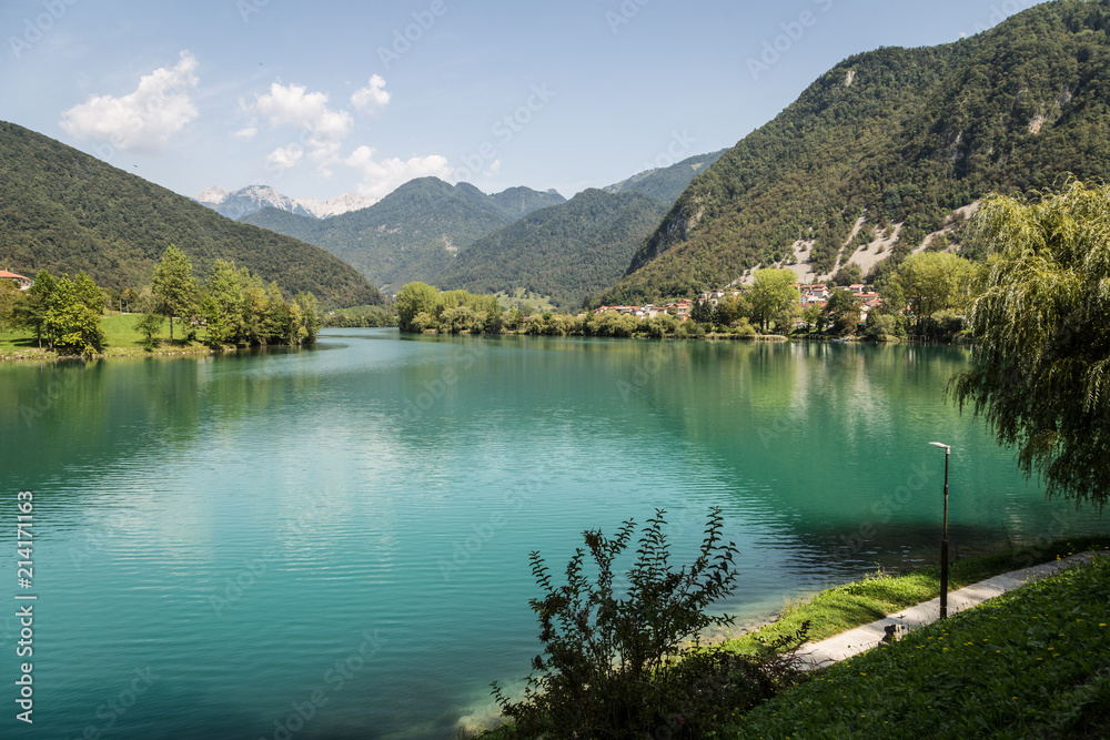 Stunning view of the Isonzo river at the feet of the Triglav mountain in Slovenia in Eastern Europe on a sunny summer day