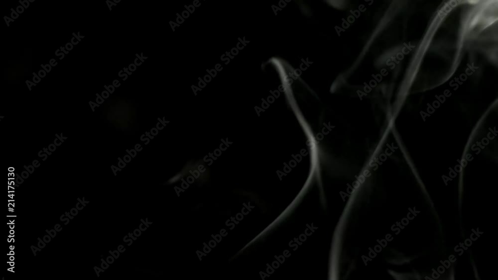 white smoke with bright scraps on black isolated background. Great for overlay in a video editor white smoke with bright scraps on black isolated background. Great for overlay in a video editor