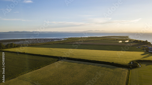 Beautiful Farm Landscape with a Sunset photo