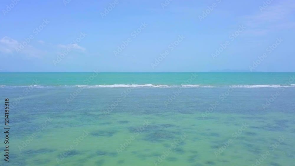 Aerial View of Shallow Turquoise Tropical Sea with Waves Aerial View of Shallow Turquoise Tropical Sea with Waves