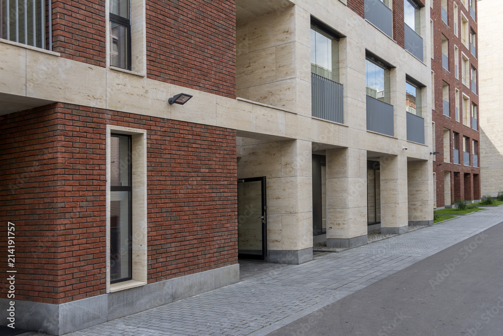 Office building in loft style. Large Windows. Red brick wall.