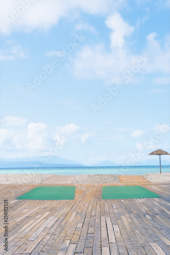 Tropical beach with umbrella. Wallpaper