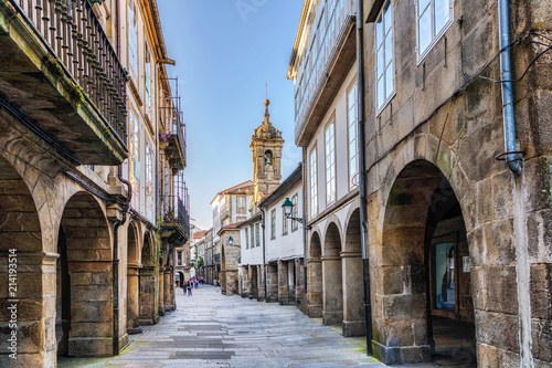 Narrow street in old town Santiago de Compostela, Galicia, Spain. © Lux Blue