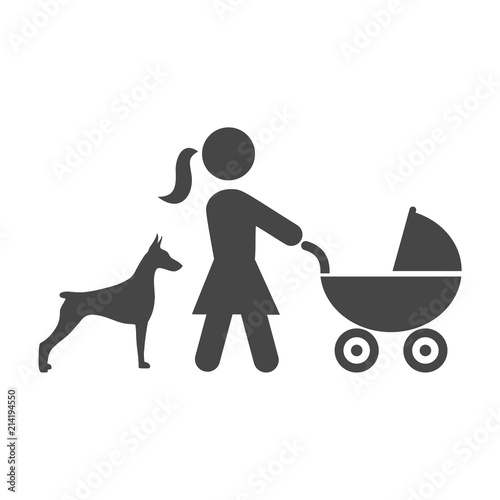 Mother with baby carriage walking with dog