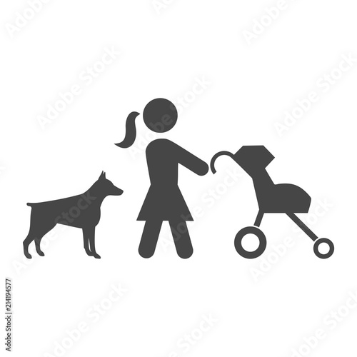 Mother with baby carriage walking with dog