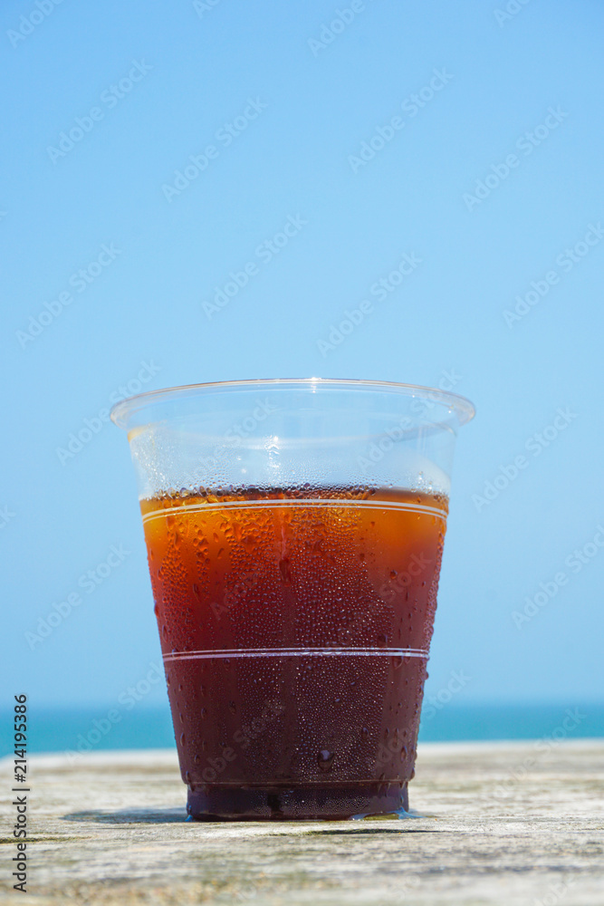 Iced coffee to drink on the beach. ビーチで飲むアイスコーヒー Iced coffee to drink on the beach. ビーチで飲むアイスコーヒー