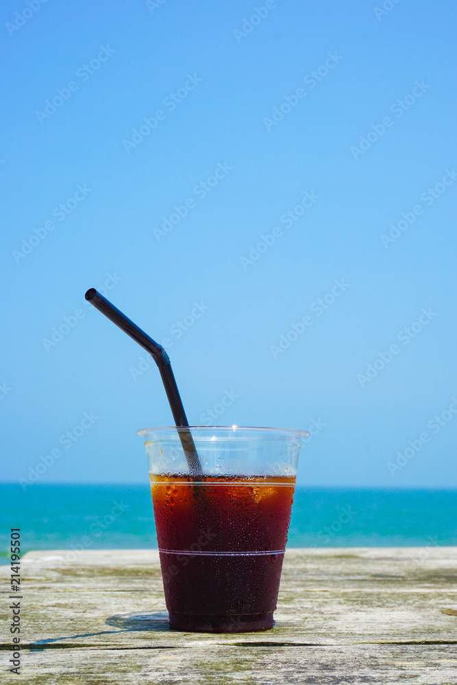Iced coffee to drink on the beach. ビーチで飲むアイスコーヒー Iced coffee to drink on the beach. ビーチで飲むアイスコーヒー