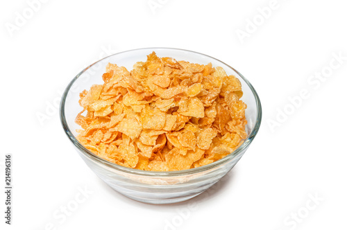 corn flakes in a glass bowl on a white background