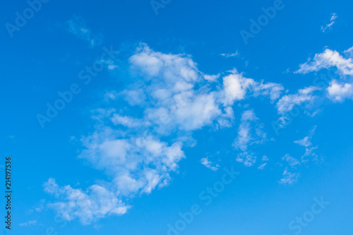 altocumulus clouds on blue sky background