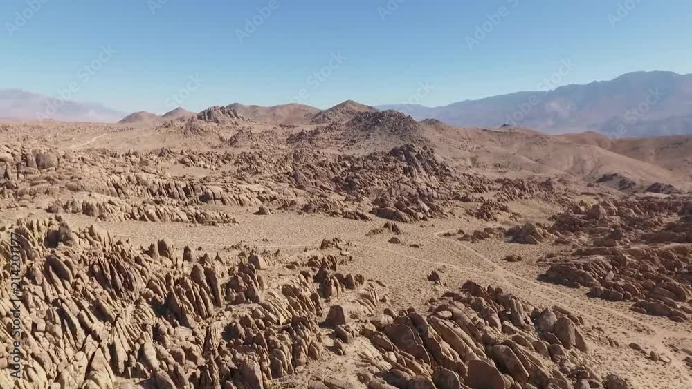 DRONE FLYOVER AND REVEAL OF ALABAMA HILLS IN THE HIGH DESERT OF CALIFORNIA DRONE FLYOVER AND REVEAL OF ALABAMA HILLS IN THE HIGH DESERT OF CALIFORNIA