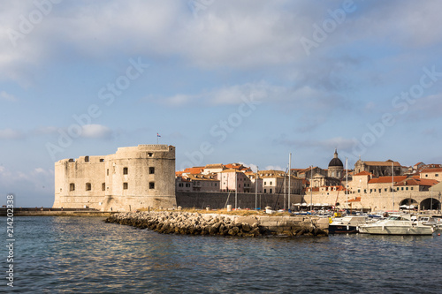 the famous fortification of Dubrovnik old town guarding the harbor on a sunny summer day in Croatia in Eastern Europe.