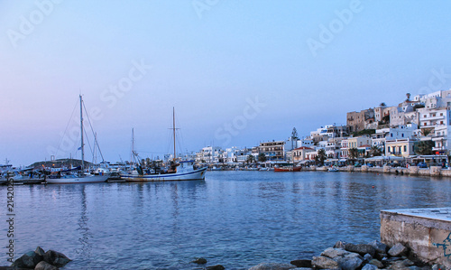 Boats on harbor on greek island