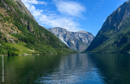 Landscape of the Neroyfjord from the pier of Gudvangen. Neroyfjord offshoot of Sognefjord is the narrowest fjord in Europe. Hardaland, Norway, Europe. © a_mikhail