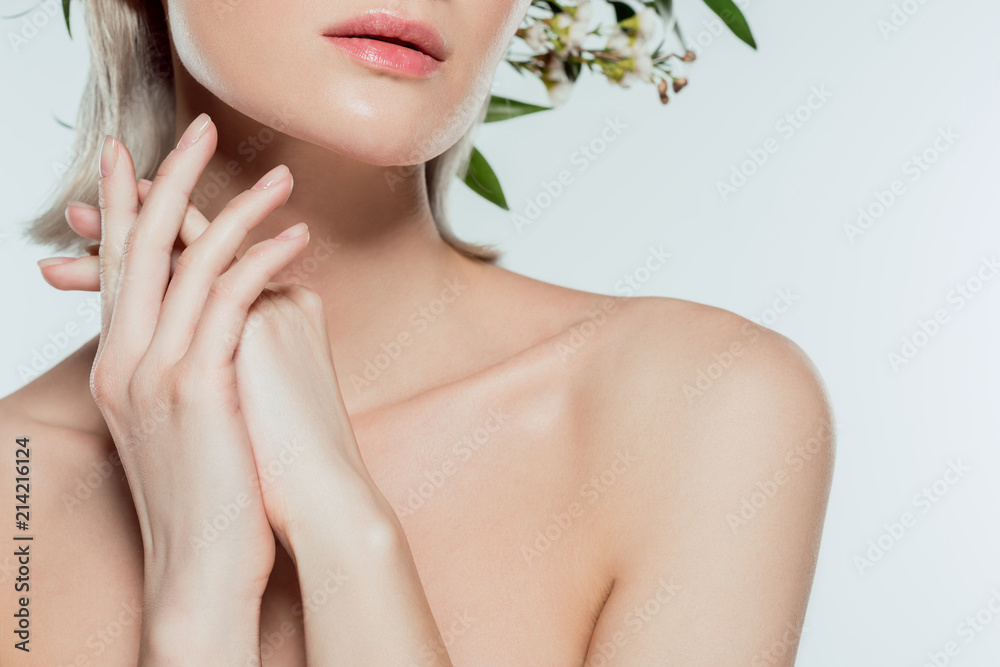 cropped view of nude girl in floral wreath, isolated on grey cropped view of nude girl in floral wreath, isolated on grey