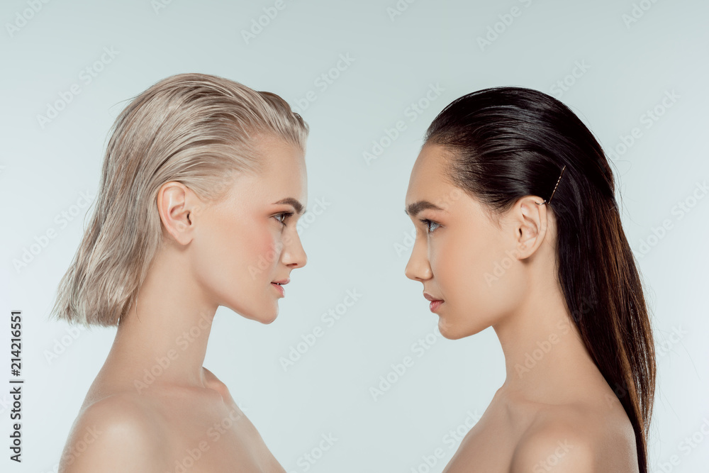 nude multiethnic girls looking at each other, isolated on grey, natural beauty nude multiethnic girls looking at each other, isolated on grey, natural beauty