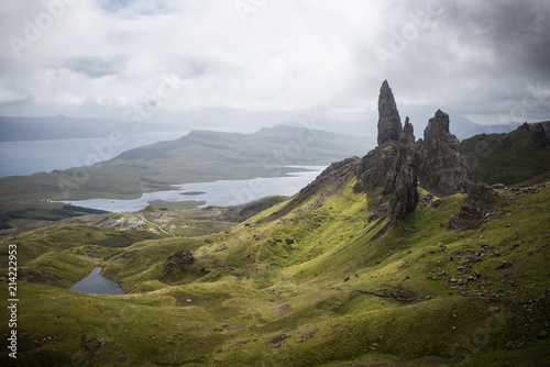 Old Man of Storr on the Isle of Skye with a sea in the background during a cloudy summer day in Scotland