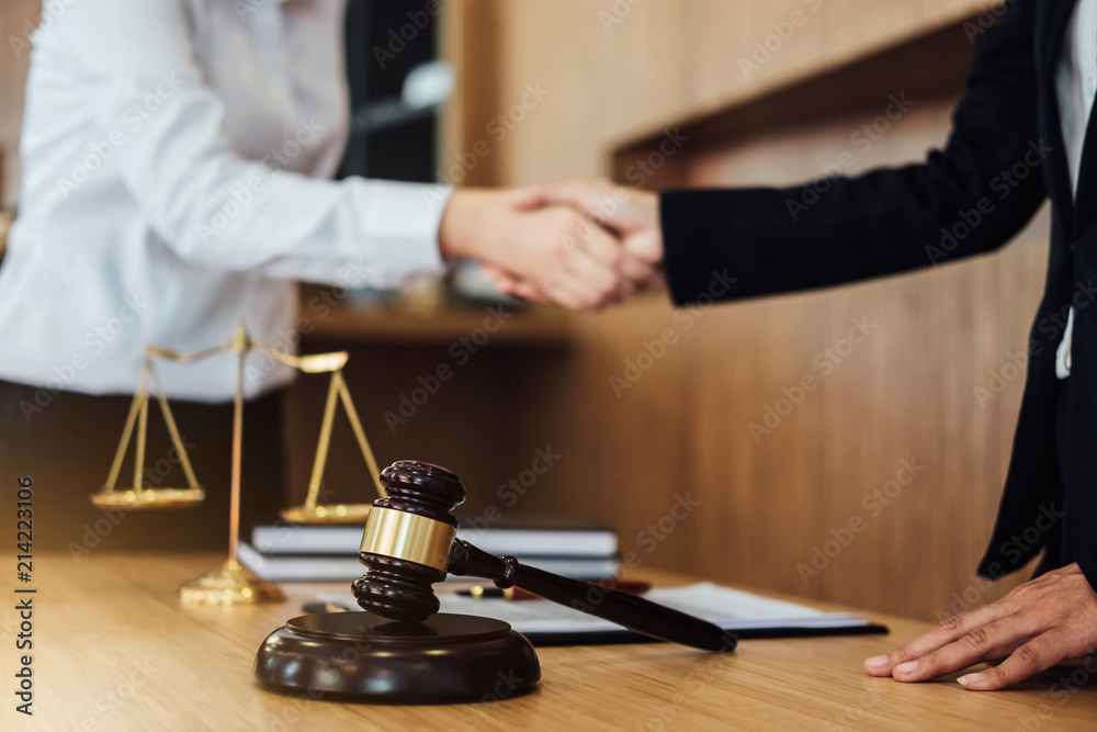 Shaking hands after good cooperation, Business woman handshake female lawyer after discussing good deal of contract, Meeting and collaboration concept Shaking hands after good cooperation, Business woman handshake female lawyer after discussing good deal of contract, Meeting and collaboration concept