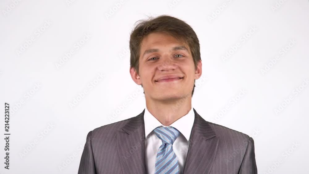 portrait of a young man. Smiling looking at the camera. portrait of a young man. Smiling looking at the camera.