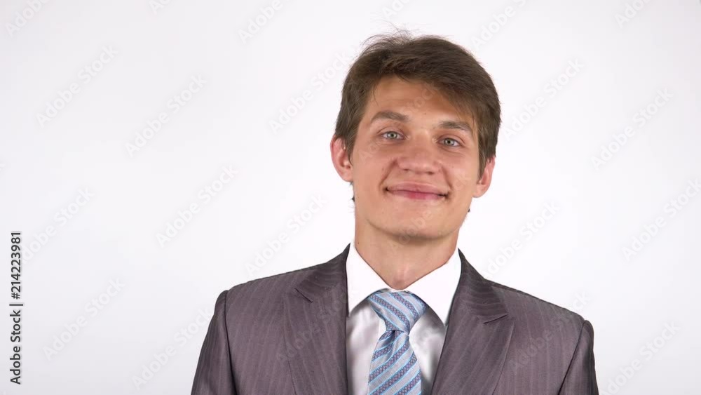 portrait of a young man. Smiling looking at the camera. portrait of a young man. Smiling looking at the camera.