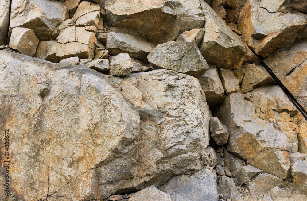 Fototapeta premium Horizontal background. Granite rock