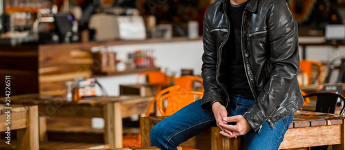 Cropped Head Caucasian Man in casual T-Shirt and leather jacket