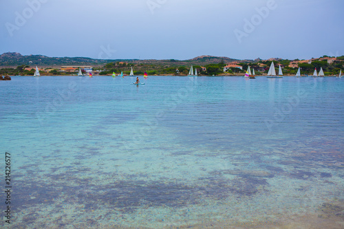 The turquoise color and transparency of the sea around the island of La Maddalena, Sardinia. Beautiful and clear beach photo