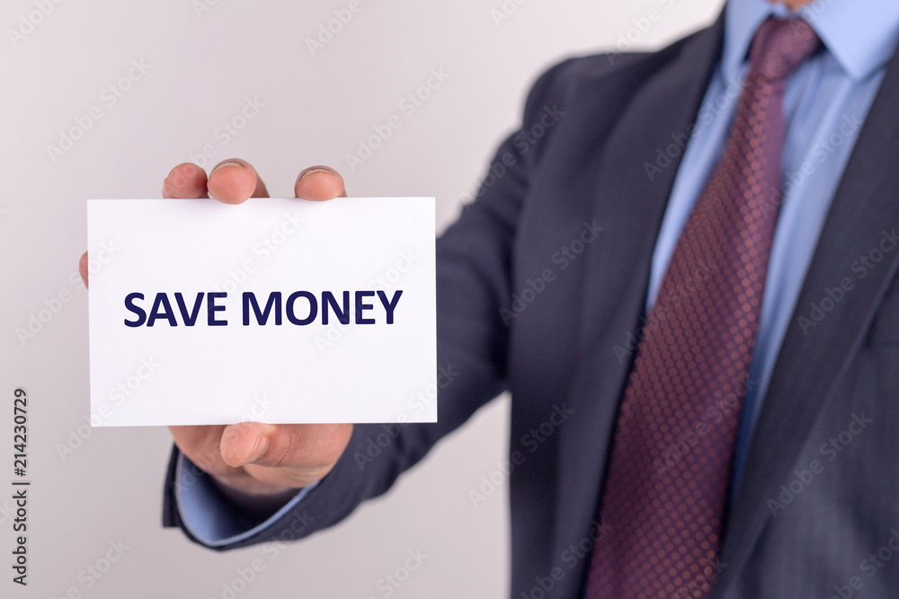 Man showing paper with SAVE MONEY text Man showing paper with SAVE MONEY text