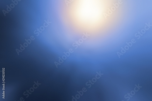 Sun seen from under the water. Abstract image - out of focus.