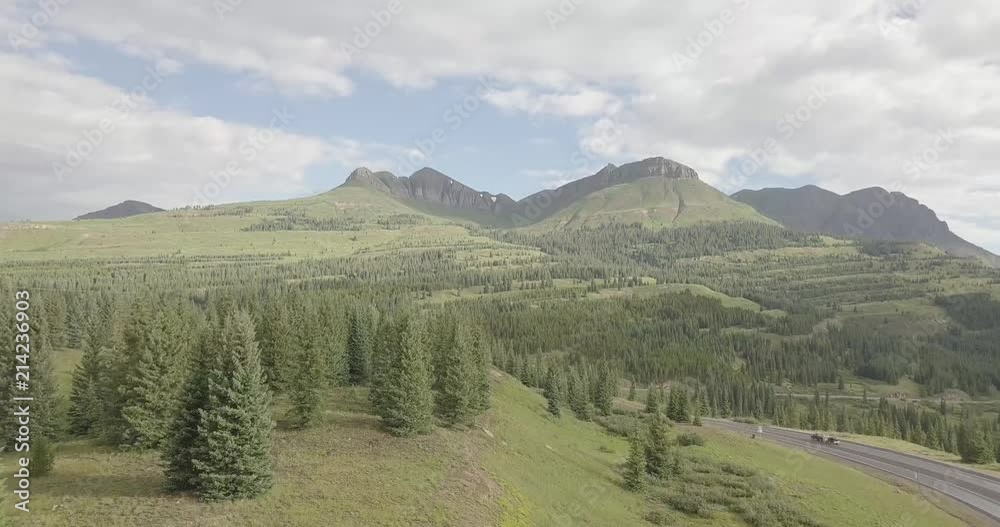 Aerial view of a mountain and road in the Rocky Mountains of southern Colorado. Aerial view of a mountain and road in the Rocky Mountains of southern Colorado.