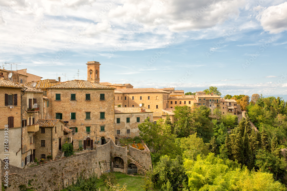 View on the old town and exterior walls of Volterra, Tuscany, Italy.