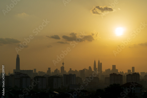 Canvas Print Majestic sunset over KL Tower and surrounded buildings in downtown Kuala Lumpur, Malaysia