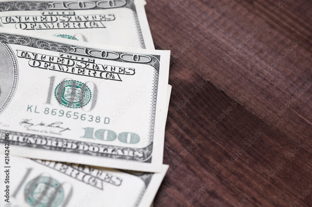 Dollars closeup. Benjamin Franklin's portrait on a bill.Concept of money and earnings. Dollars closeup. Benjamin Franklin's portrait on a bill.Concept of money and earnings.