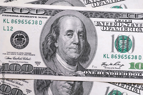 Dollars closeup. Benjamin Franklin's portrait on a  bill.Concept of money and earnings.
