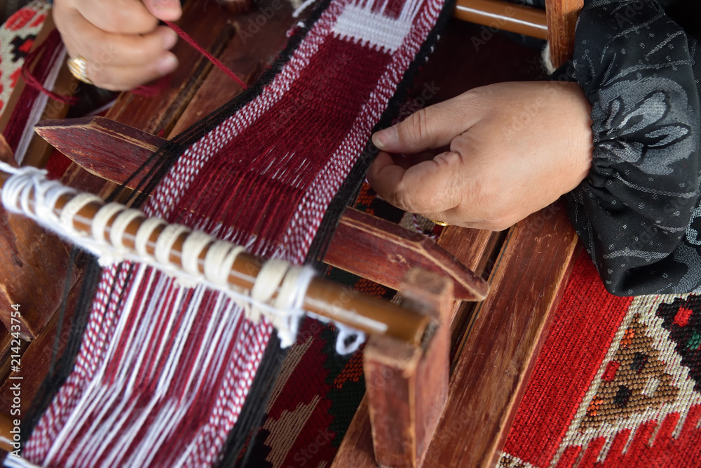 Hands of an arabian female weaver - obrazy, fototapety, plakaty 