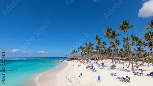 blue sea Bahamas, beach sand, exotic palm trees, white sand, white sand beach / Top view of the beach in the Caribbean Sea. Paradise Island, a very beautiful beach with white sand. photo