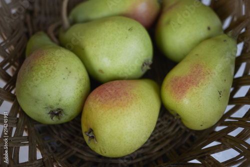 Ripe pears in a basket