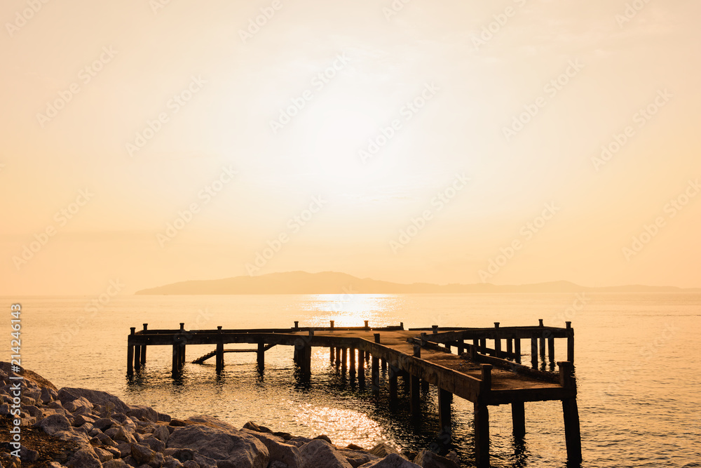 Seascape view of wooden bridge at Khao Leam Ya – Mu Ko samet National Park in sunset time, Rayong province, Thailand