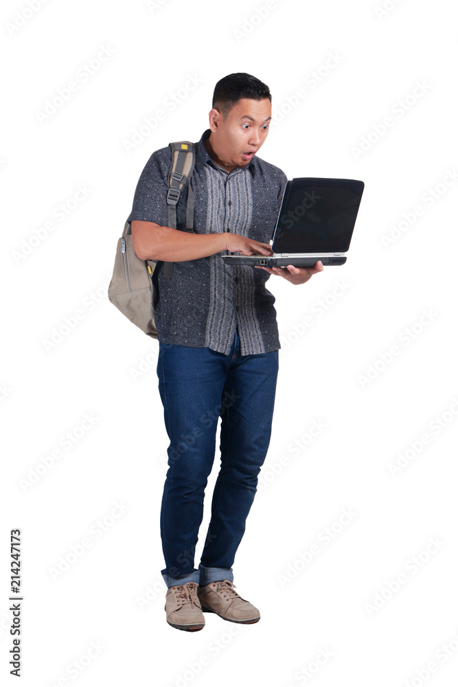 Young Asian Student With Laptop. Shocked Expression Young Asian Student With Laptop. Shocked Expression