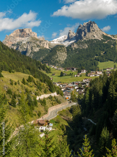 Beautiful view of idyllic mountain scenery in the Dolomites with mountain village , Val di Funes, South Tyrol, Italy photo