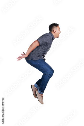 Levitation, Young Man Flying. Side View