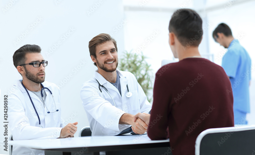 doctors discuss with the patient the x-ray doctors discuss with the patient the x-ray