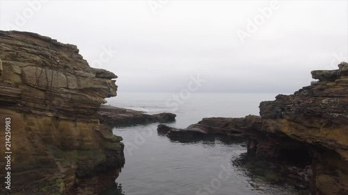 drone view over the rocks and rock pools at Howick in Northumberland.