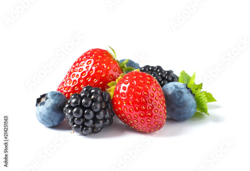 Strawberries, blackberries and blueberries on white background