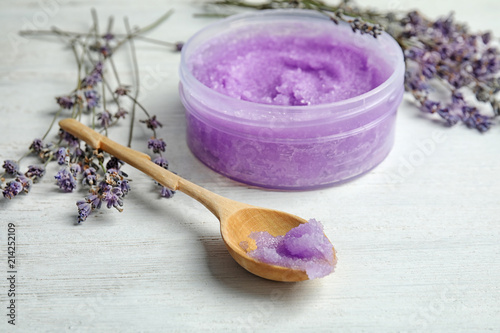 Fototapeta Naklejka Na Ścianę i Meble -  Composition with lavender flowers and natural cosmetic on wooden background