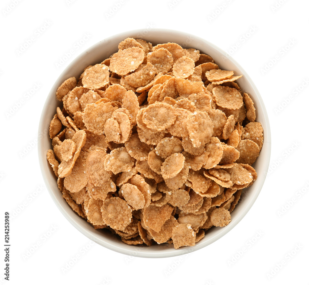 Obraz premium Bowl with wheat flakes on white background. Healthy grains and cereals