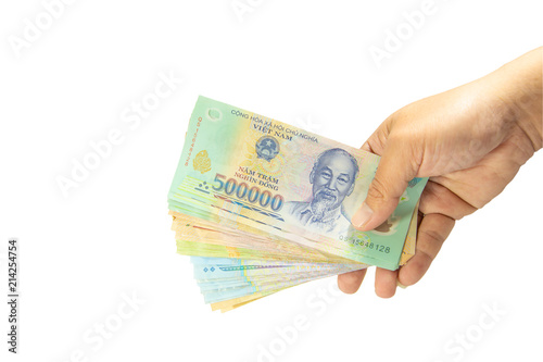 Clipping path Money in Vietnam on left hand (Socialist Republic Of Vietnam), Dong, VND, Pay, exchange money isolated on white background.