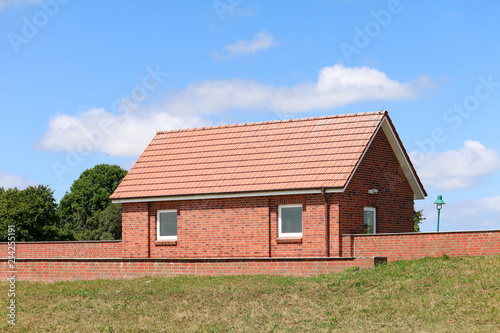 Wallpaper Mural Red brick building in a summery idyll Torontodigital.ca